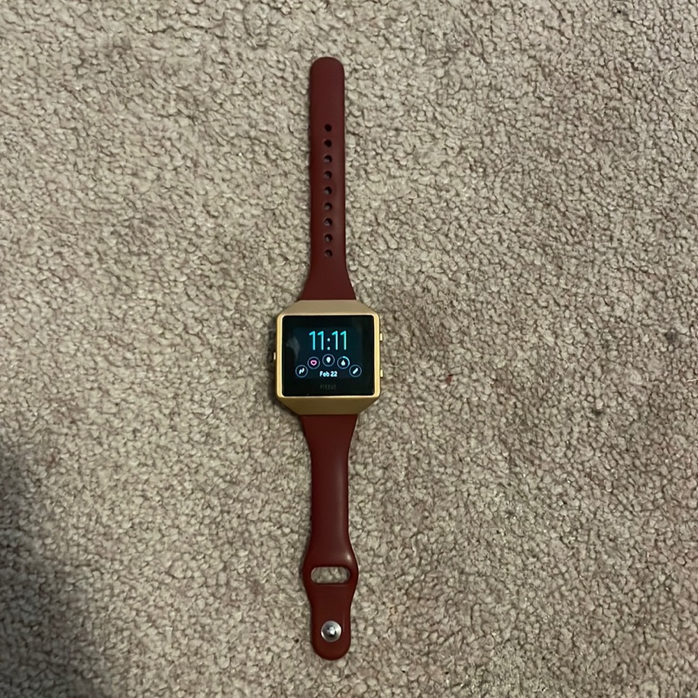 Fitbit with rose gold and maroon band! ⌚️